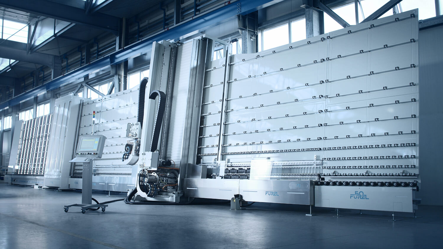Forel FG Fast Grinder Machine per la molatura automatizzata dei bordi del vetro in ambiente industriale